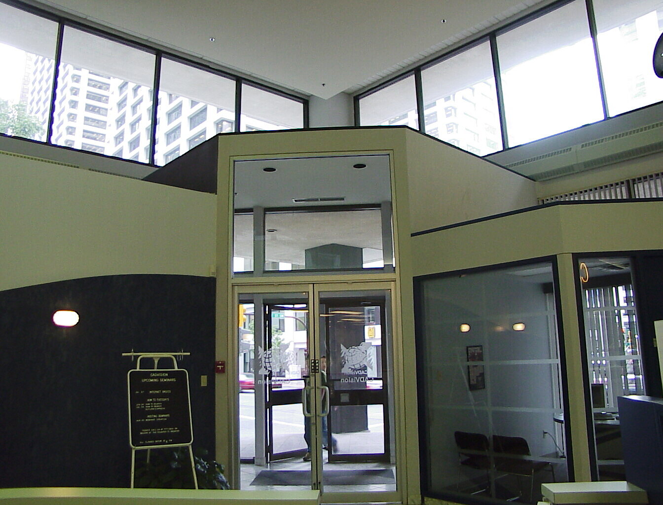 Looking out the front doors — the seminar board