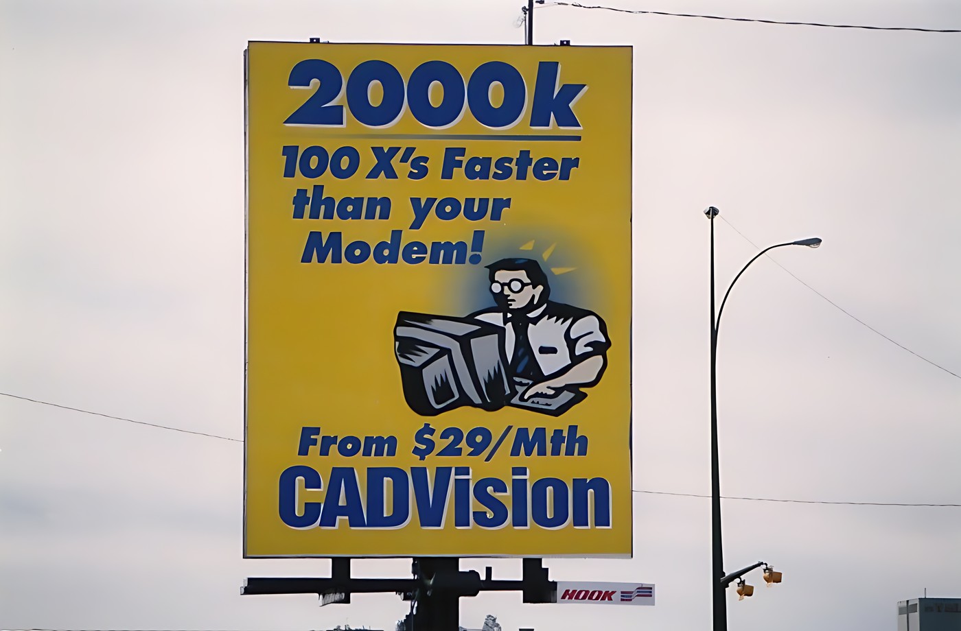 Large yellow billboard with a blue and white graphic design